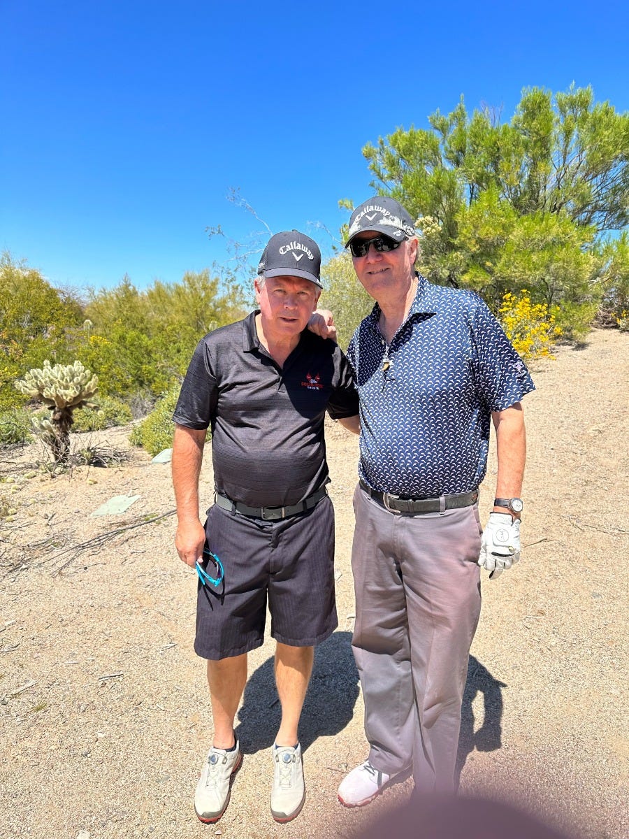 Neal Smith playing golf with Eric Olander at Coopstock 2023